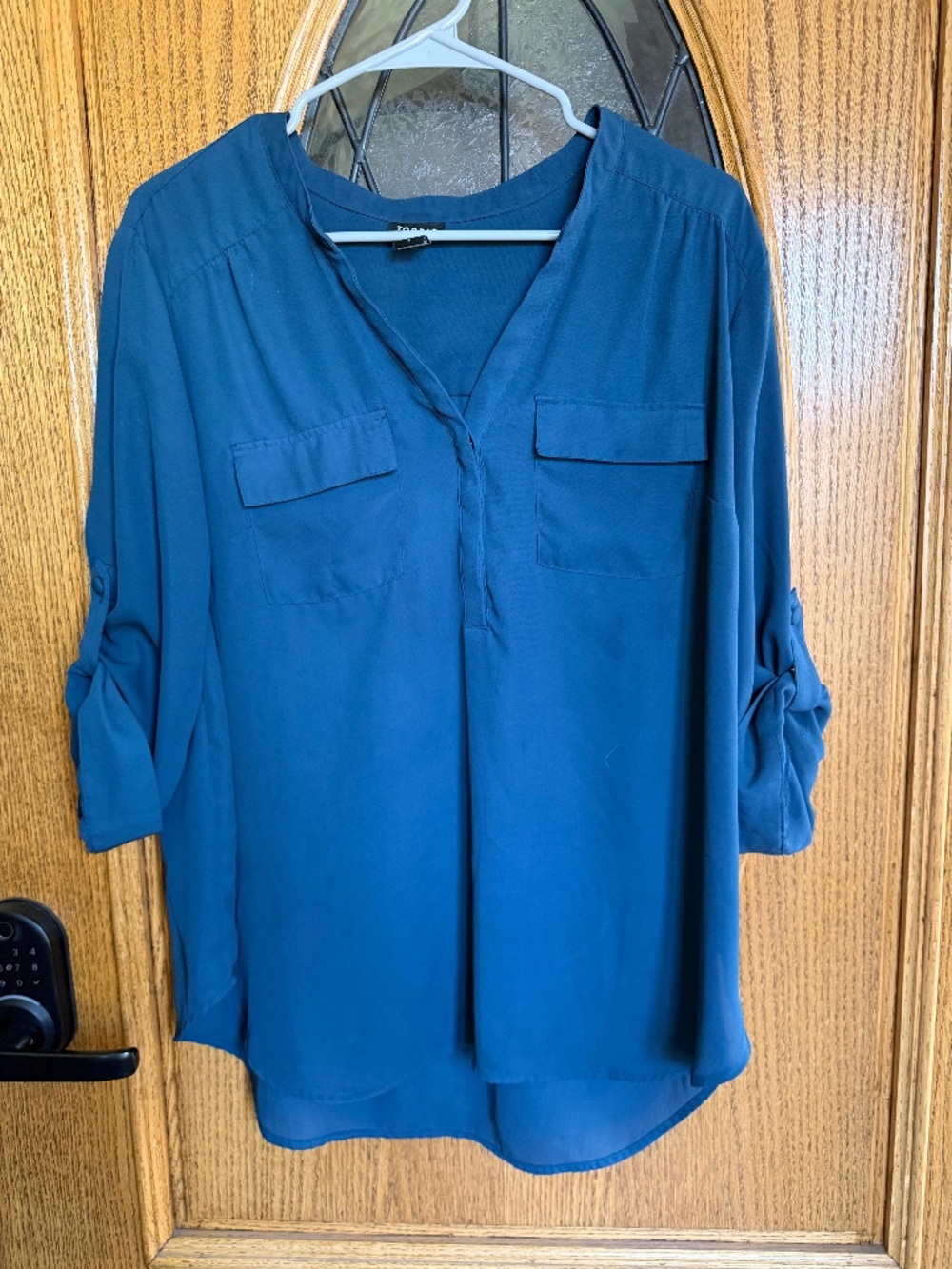 Torrid blue blouse with pockets and 3/4 sleeves. Size: 1